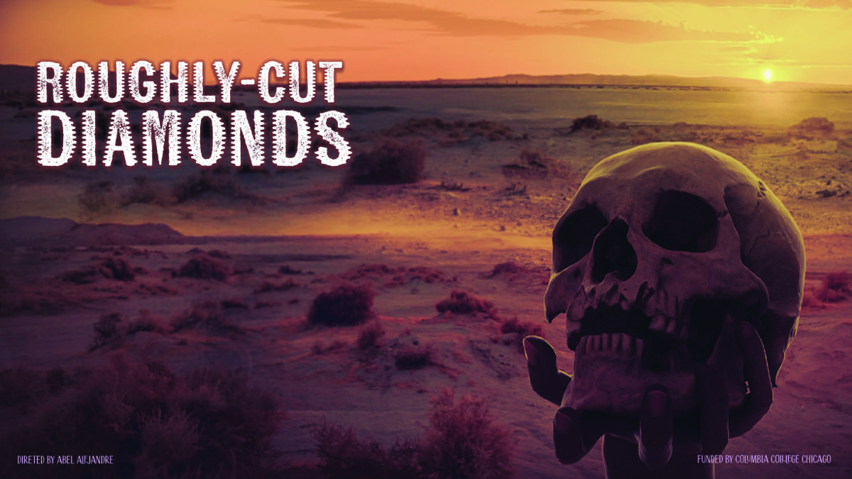 Roughly Cut Diamonds poster: a hand holds a human skull up against a desert landscape at sunset